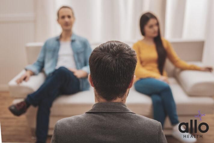 Girl sit on couch looking in distance out the window feels frustrated thinking how to know when to end a relationship Coping Mechanisms For Sexual Trauma and Disorders