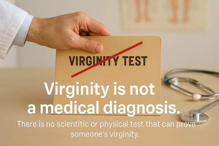 Alt text (short version): Doctor’s hand closing a folder labeled “Virginity Test” crossed out in red, with medical items on the desk.