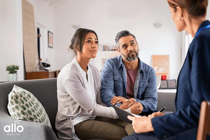 Couple sitting and getting Cognitive Behavioral Therapy For Erectile Dysfunction