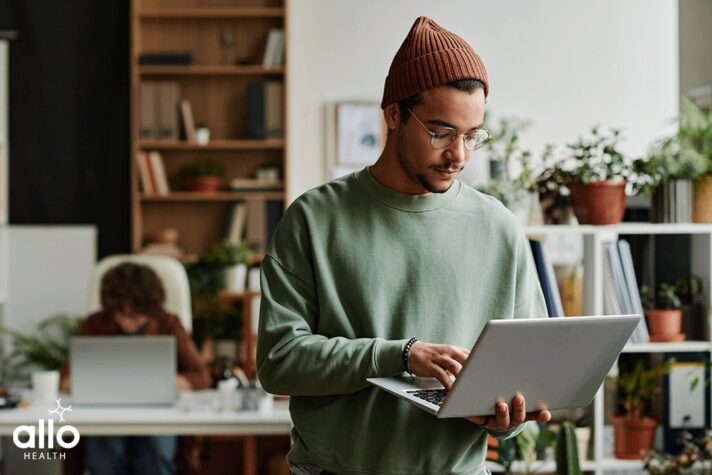 man searching in online for the answers on Priapism